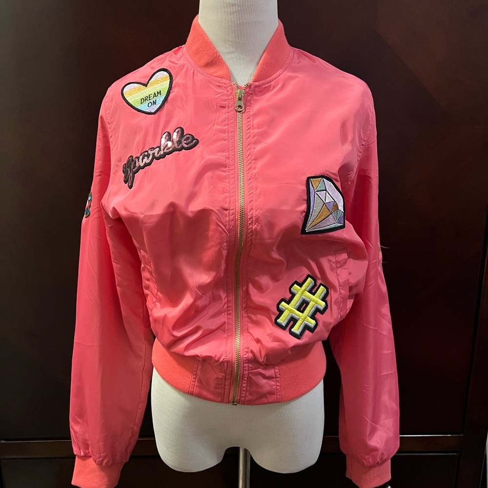 Fun melon, colored windbreaker jacket with patches